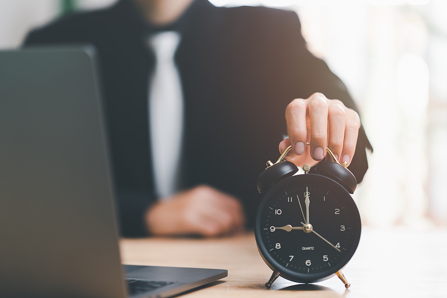 Clock On Businessman Hand, Time Management Concept,effective Bus