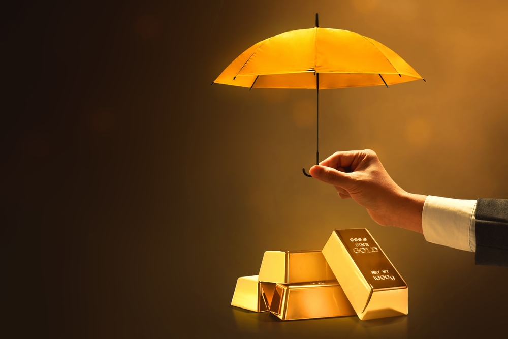 Businessman,Hand,Holding,Glowing,Shiny,Golden,Umbrella,On,Dark,Background