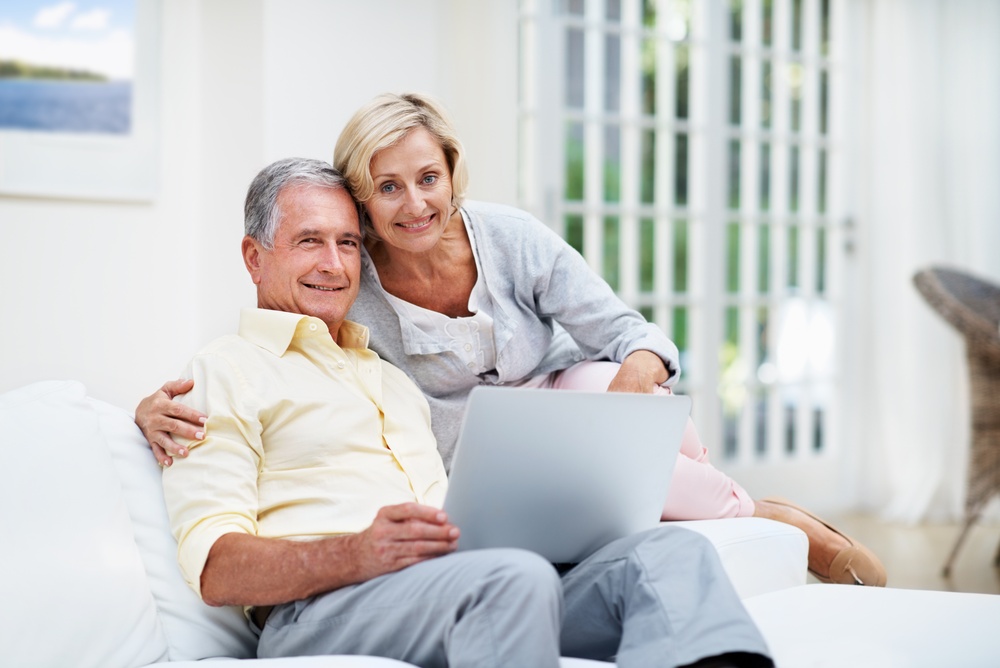Laptop,,Happy,And,Portrait,With,Old,Couple,On,Sofa,For