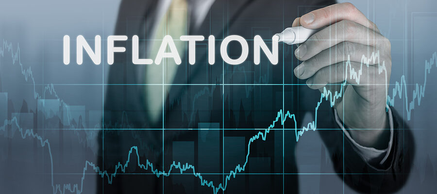 Businessman Writes Word Inflation Against Background Of Graph Ch Businessman Writes Word Inflation Against Background Of Graph Ch